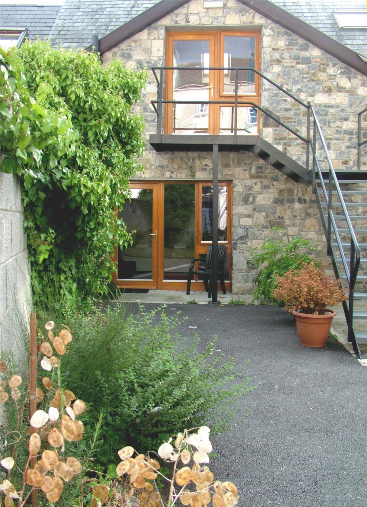 Cashel Town Center Inn Habitación foto